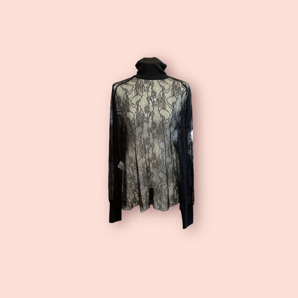 Blusa in pizzo kostumn