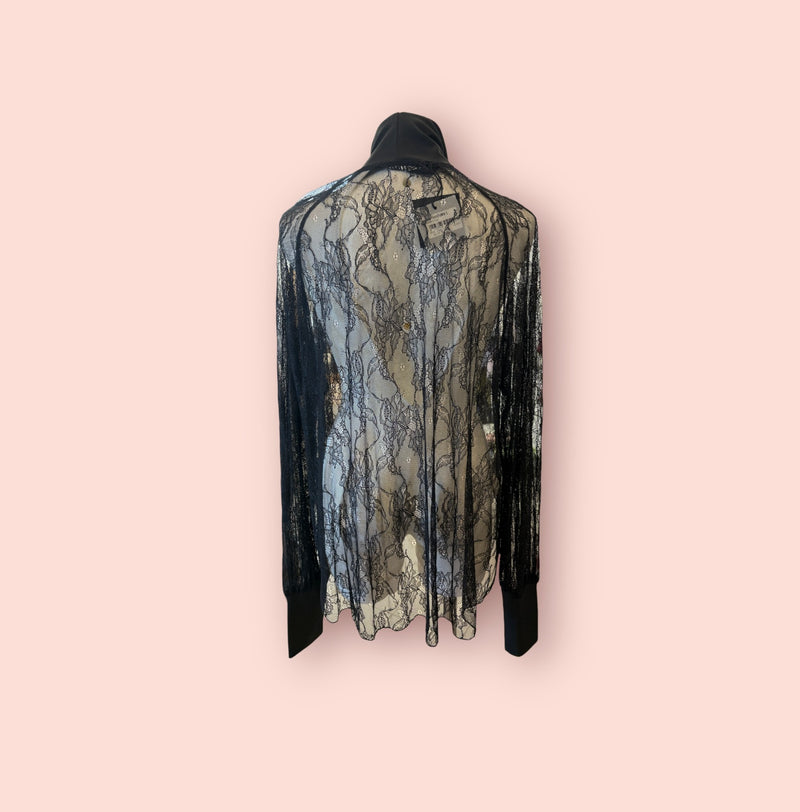 Blusa in pizzo kostumn